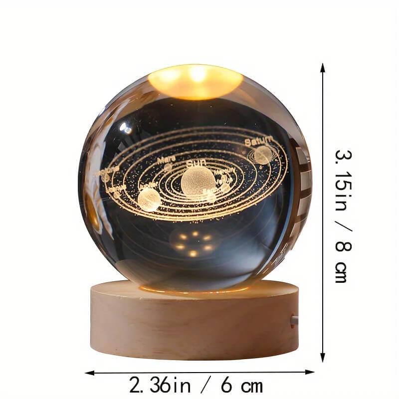 3D crystal CosmoSphere featuring the solar system with laser-engraved planets and orbits on an illuminated LED base, blending art, science, and technology in a decorative and educational piece.